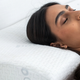 Image for article titled The Dosaze Curved Orthopedic Memory Foam Pillow Made Me Excited To Go to Bed